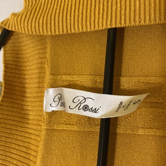 It’s a yellow mustard color sweater great condition. - Picture 4 of 4